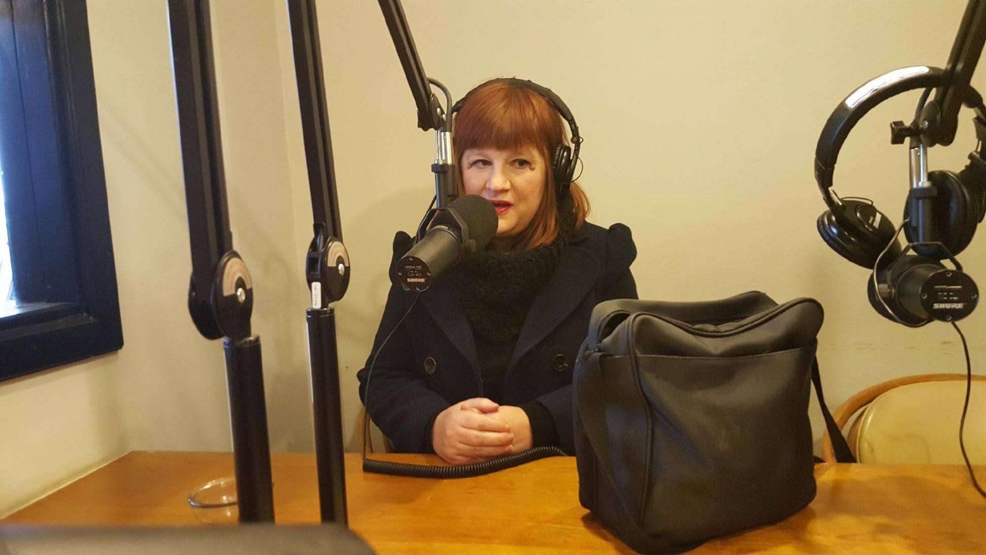 person giving radio speach